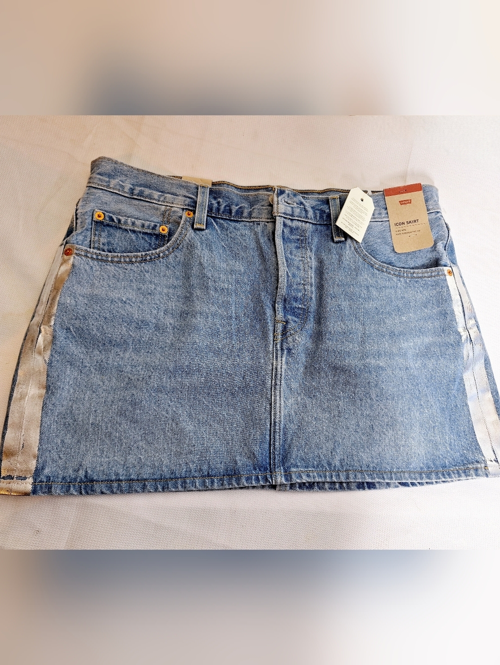 NWT Levis "The Icon Silver Streak" Preppy core, button-fly, denim mini skirt.